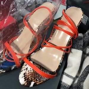 Never worn, Round Toe snake pattern lace up heels